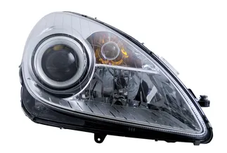 Hella Front Left Headlight Assembly - 1718203661