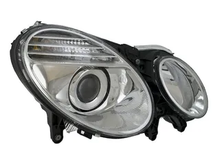 Hella Front Right Headlight Assembly - 2118203461