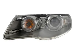 Hella Left Headlight Assembly - 7L6941039E
