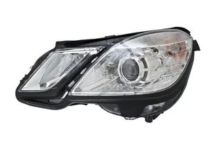 Hella Front Left Headlight Assembly - 2128209561